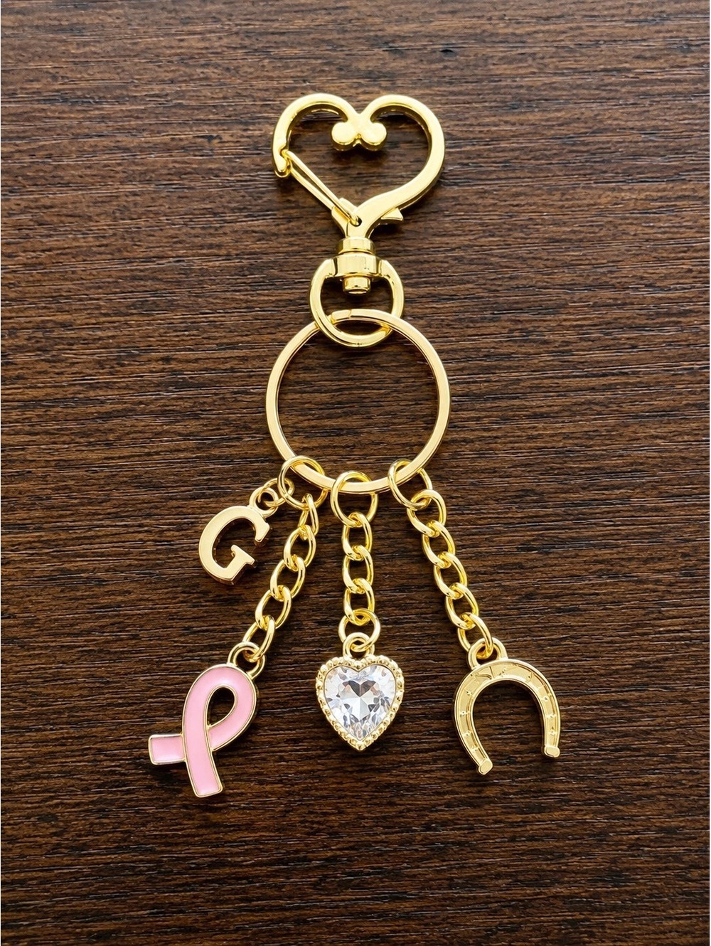 Gold Tone Keychain with Pink Ribbon, Heart Crystal, and Horseshoe Charms